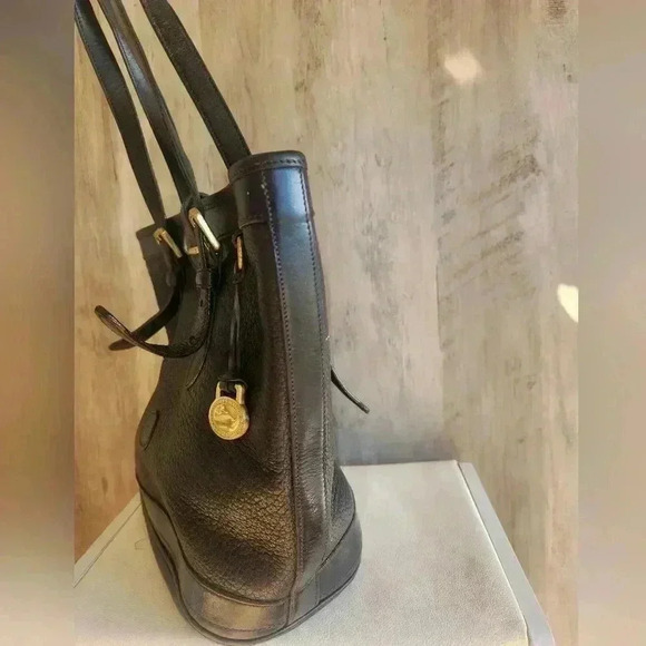 Dooney & Bourke Small Black Bucket Bag from the Metro Collection Vintage Gold - Picture 7 of 14